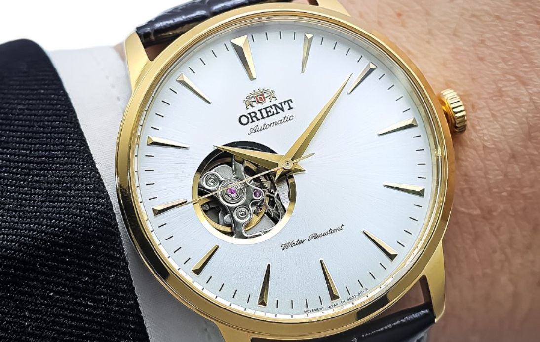 Pozłacany zegarek męski do garnituru na pasku Orient Esteem II Open Heart Automatic