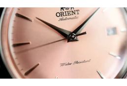 Zegarek męski z różową tarczą Orient...